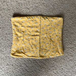 Pastel yellow tube top. Size extra small.